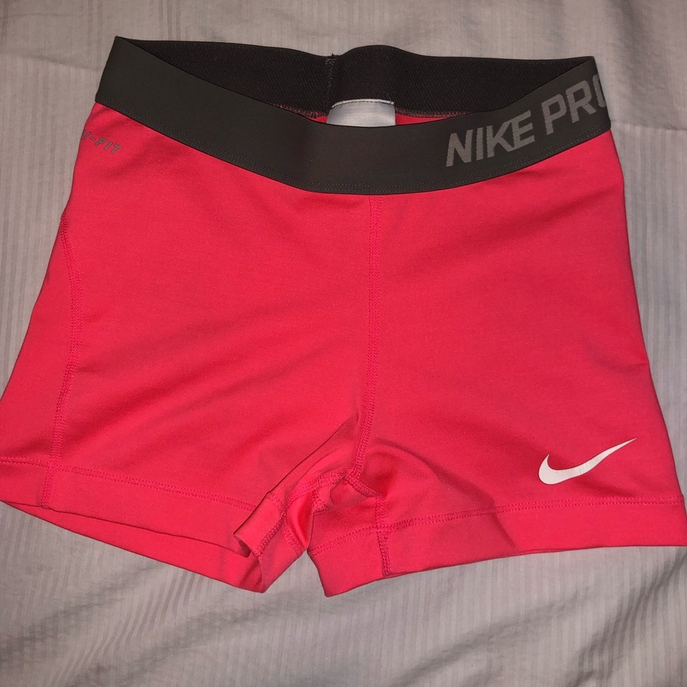 Bright pink nike pro spandex
